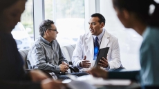 Doctor discussing with patient