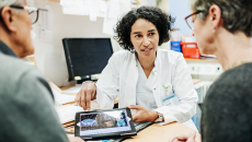 Doctor talking to patients