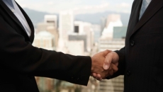 Merger handshake