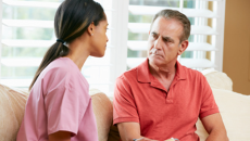 nurse with patient home visit