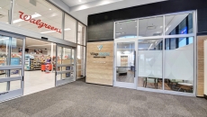 A VillageMD entrance next to a Walgreens entrance