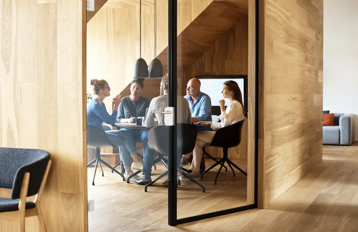 Executives meeting in a conference room.