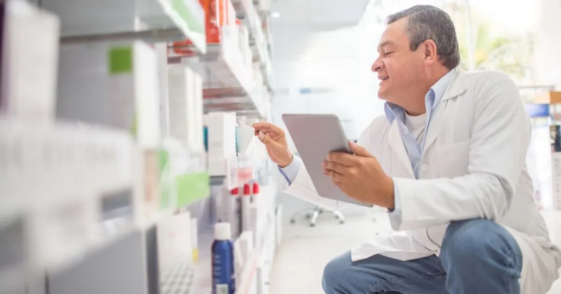 Pharmacist with tablet