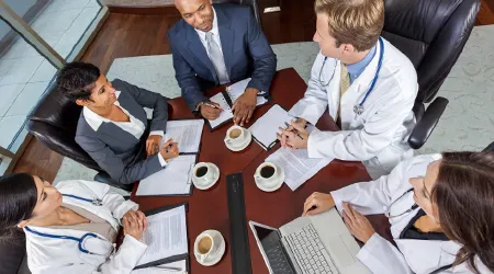 hospital executives at a table