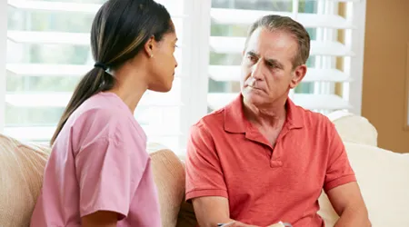 nurse with patient home visit