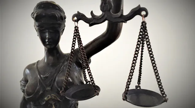 Statue of Justice with scales. Photo: Blanchi Costela/Getty Images