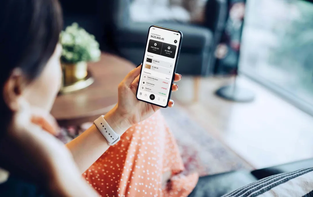 Person uses app on phone. Photo: d3sign/Getty Images