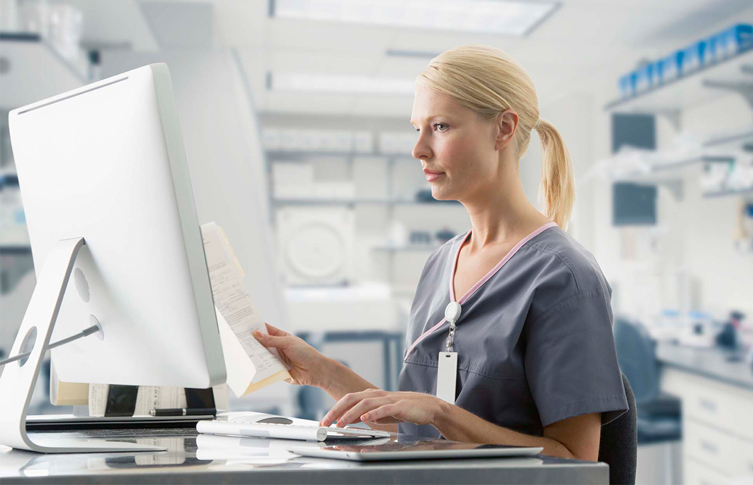 Nurse working on computer
