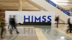 HIMSS Logo in busy lobby