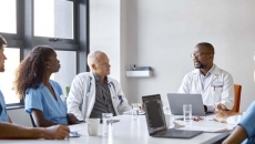 Hospital conference at a long table
