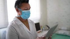 Doctor using tablet