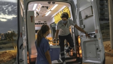 Ambulance with healthcare workers