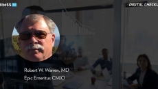 Dr. Robert W. Warren, Epic_Business meeting with interactive screen Photo by Hispanolistic/E+/Getty Images