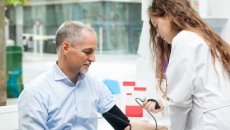 Doctor treating patient.