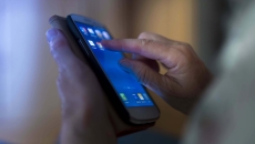Close up of person on phone app
