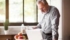 Senior patient using a computer.