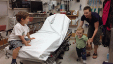 children with mother in hospital room, image from flickr