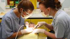 dentists treating patient
