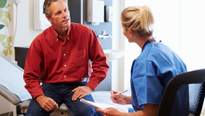 doctor speaking with patient