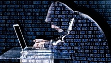 hacker on laptop