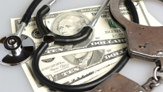 stethoscope and handcuffs on money