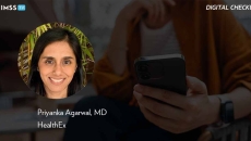 Dr. Priyanka Agarwal, HealthEx_Person at cafe using smartphone Photo by d3sign/Moment/Getty Images