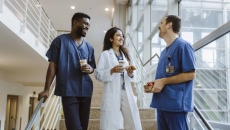 Clinicians talking in a hospital