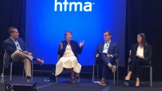 OSF HealthCare CFO Michael Allen, Henry Ford Health Executive VP and CFO Robin Damschroder and Jana Cook, senior VP and CFO for Phelps Health, take questions from moderator Norman Mosrie of Forvis at the HFMA annual conference.