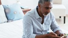 Person examining smartphone