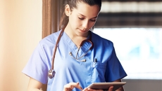 Medical professional with tablet