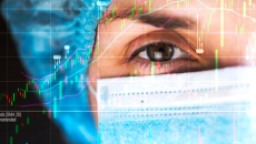 Healthcare worker in mask superimposed over data graph