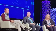 The panel on stage at HIMSS22