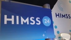 HIMSS24 stage sign