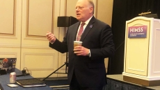 HIMSS President and CEO speaks at press conference during HIMSS25