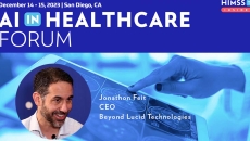 Jonathon Feit at Beyond Lucid Technologies_Doctor looking at brain scan on tablet photo by katleho Seisa/Getty Images