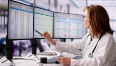 Clinician working on multiple computers