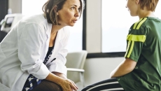 Physician with child patient