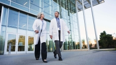 Physicians leave a hospital.