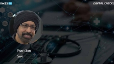 Punit Soni, Suki_Doctor analyzing medical report Photo by ipopba/iStock/Getty Images Plus