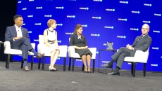 Pelley and the panel members seated on stage. Photo: Susan Morse/HFN