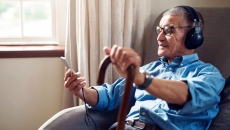 Senior man using smartphone