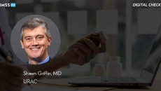 Dr. Shawn Griffin at URAC_Doctor holding medicine bottle_Photo by ArLawKa AungTun/iStock/Getty Images Plus