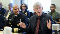 Former Surgeon General Dr. Jerome Adams (L) and Dr. Francis Collins (R)