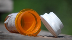 A pill bottle lying on its side