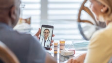 Couple attending telehalth appointment