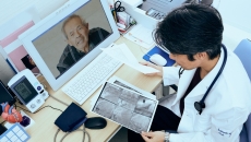 clinician consulting with patient remotely