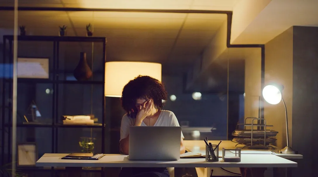 A woman is stressed at work