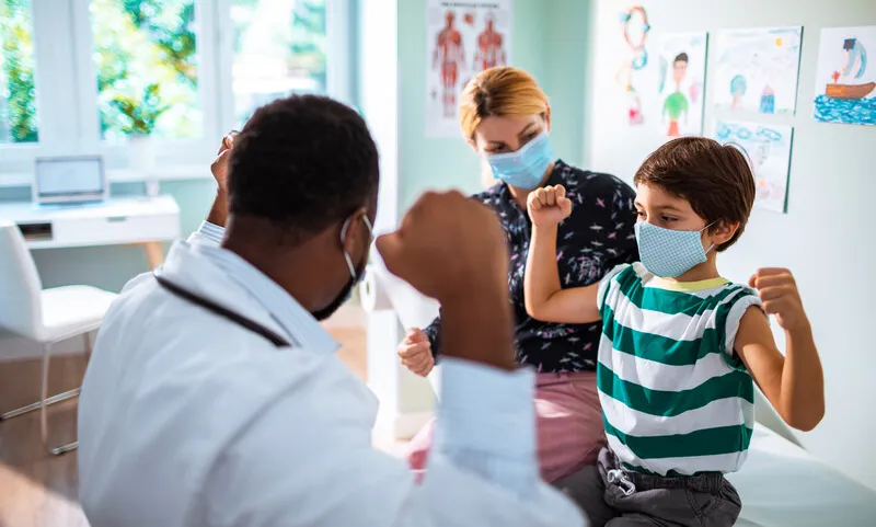 Doctor with child patient Doctor with child patient