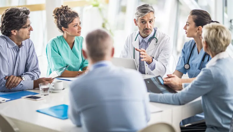 Healthcare workers around a table