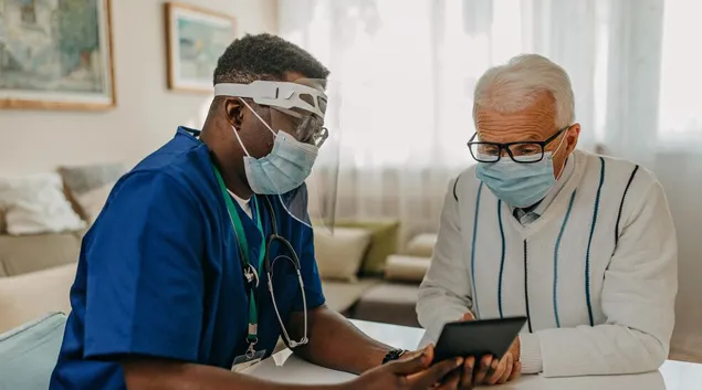 Home care visit with tablet